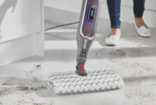 How do you clean a shark steam mop head?